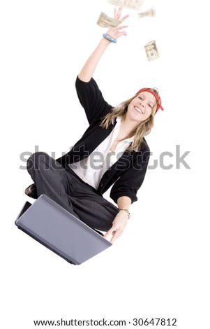 stock photo : Young woman winning online flinging money in the air