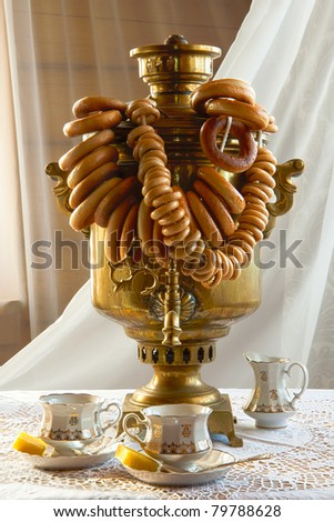 Russian samovar for tea drinking with bagels