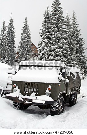 Truck covered with snow