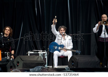 LVIV - MAY 22: Singer Goran Bregovic drinks beer at stage on festival \