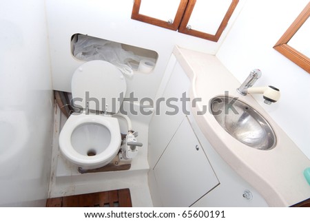 Latrine and shower on sailing boat with toilet paper