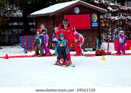 CHAMONIX-MONT-BLANC - JANUARY 07: Ski instructors study young skiers in children ski school, January 07, 2011 in Chamonix-Mont-Blanc, France