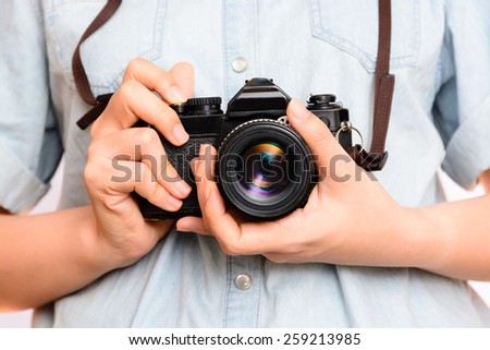 hand holding vintage camera