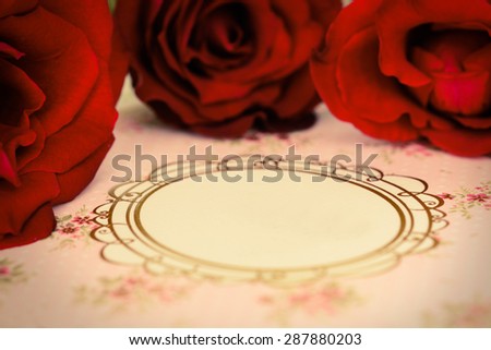 Red rose on blank wedding card