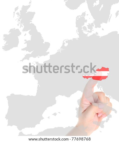 Finger touch on a future innovative transparent screen display Austria map flag