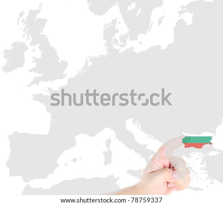 Finger touch on a future innovative transparent screen display Bulgaria map and flag