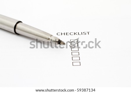 Pen Pointing at Checklist box