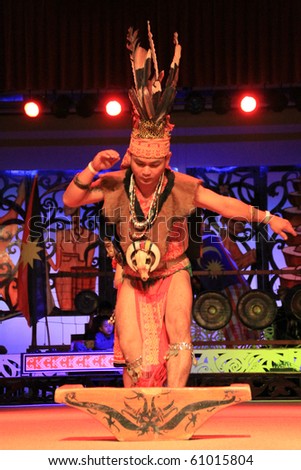 KUCHING, SARAWAK, MALAYSIA - SEPTEMBER 13: The Iban Warrior perform the ngajat (tribal dance) at the Sarawak Cultural Village on September 13, 2010 in Santubong, Sarawak.
