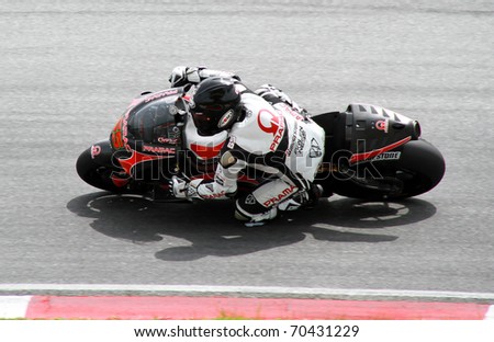 SEPANG, MALAYSIA - FEBRUARY 3: Loris Capirossi from Pramac Racing Team (Ducati) Team during MotoGP Pre-Season Test Day 3 on February 3rd 2011 at Sepang International Circuit, Malaysia