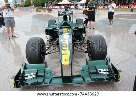 PUTRAJAYA, MALAYSIA - APRIL 2: Front view of F1 Car from Team Lotus at street demonstration April 2, 2011 in Putrajaya, Malaysia. The event is a promotion for F1 Malaysia Grand Prix 2011.