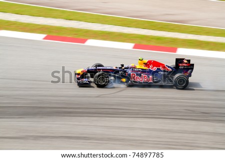 SEPANG, MALAYSIA- APRIL 8: Mark Webber of Red Bull Racing in action at PETRONAS Malaysia Grand Prix on April 8, 2011 in Sepang, Malaysia. Webber was fastest by a country mile in Practice One.
