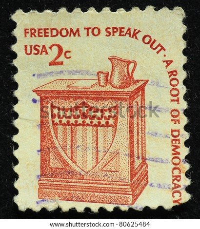 UNITED STATES OF AMERICA - CIRCA 1985: A stamp printed in the USA shows words freedom to speak - a root of democracy, circa 1985