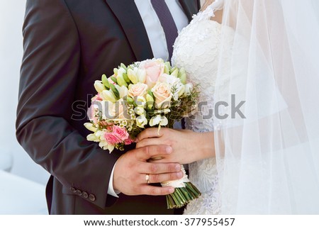 Wedding couple with the bouquet