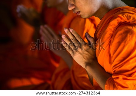 Monks Praying in Marble Temple of Bangkok, Thailand