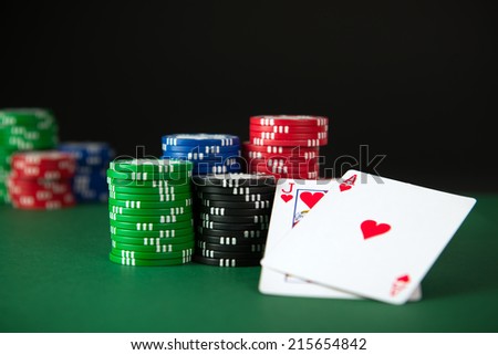 Blackjack and poker chips on the table Blackjack and poker chips on the table