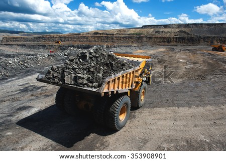 Siberia, Russia - June, 2015: Big yellow mining truck groundmoving in Russia.