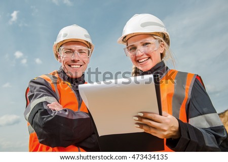 Two people working