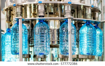Filling bottles with water