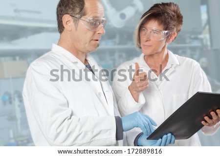 A Team of chemist are discussing the result of an analytical test.