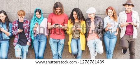 Group of millennial friends watching social story on smart mobile phones - People addiction to new technology trend - Concept of youth, z generation, social and friendship - Main focus on center guys