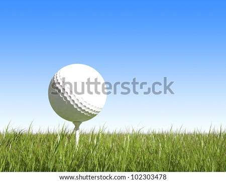 golf ball on green grass blue sky background