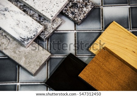 Kitchen counters and kitchen cabinet colors samples over floor tiles