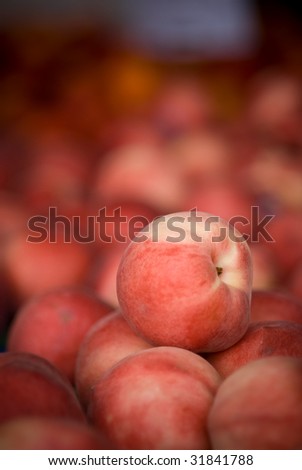 white peaches in a stack