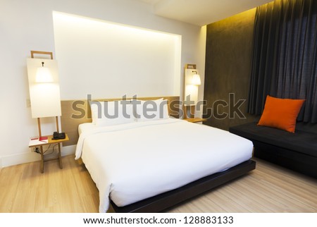 Minimalism Hotel Bedroom In Warm Tone Color.