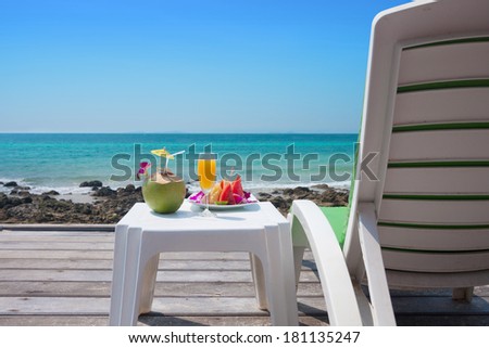 relaxing with healthy fruits and drink in the tropical atmosphere of koh larn island ,thailand.