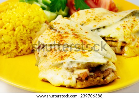 the chicken fillet baked with bacon served with rice