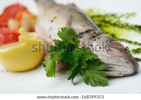 Whole boiled fish spiced vegetables- seafood