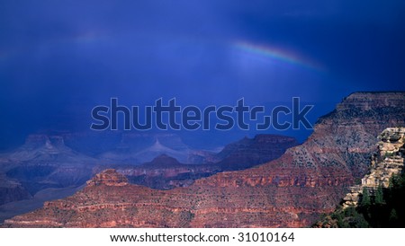 Grand Canyon with rainbow during storm
