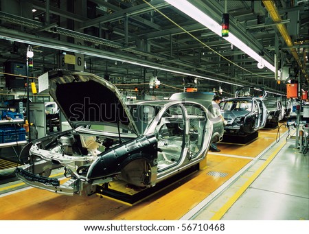 stock photo car production line with unfinished cars in a row