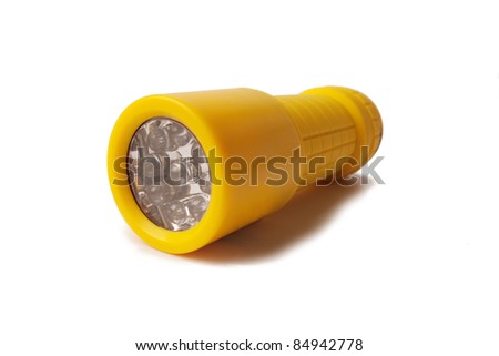 Yellow LED Flashlight isolated on white background