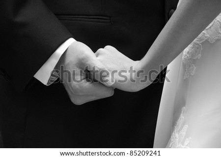 Bride and Groom showing Affection