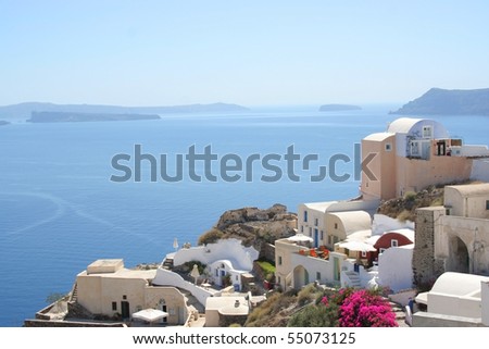 White-dark blue houses on a blue background of the sea