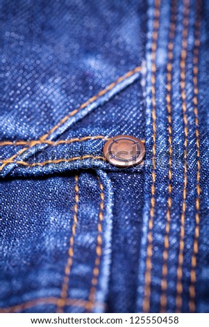 Macro Detail of blue jeans fabric with a shallow DOF