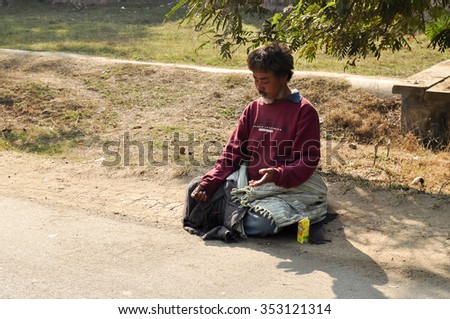 BODH GAYA, INDIA - DECEMBER 2013: street meditation.
