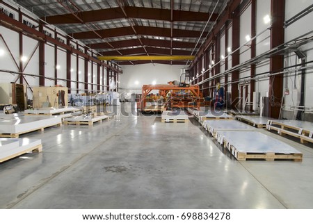 Factory floor. Manufacturing, warehousing, aluminium composite panels for facade