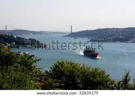 red ship on bosphorus in istanbul