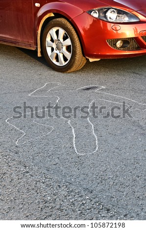 Contour of a person drawn at the asphalt