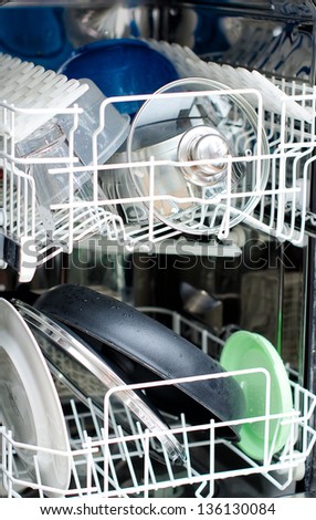 Open dishwasher after cleaning