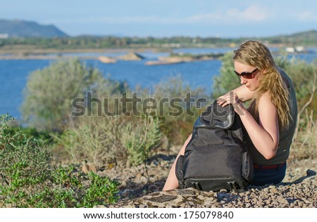 Female tourist on vacation in the mountains.