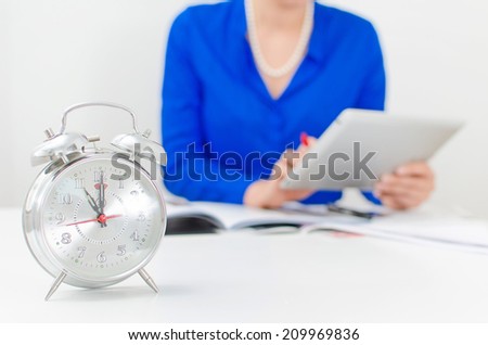 Schedule of the day. Workday. Woman working with tablet pc.