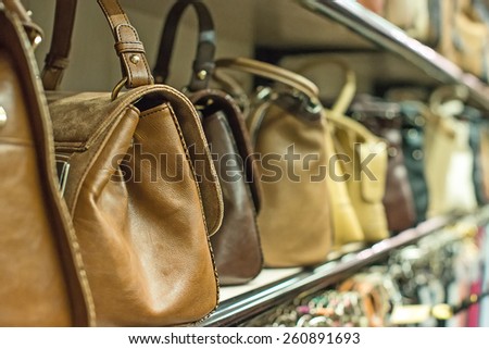 Leather handbags collection in the store.