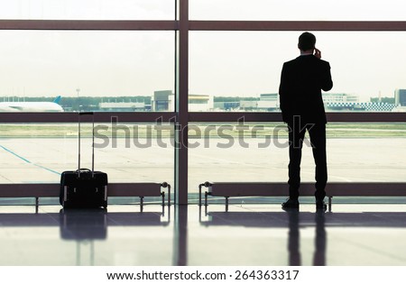 Man with luggage in the airport