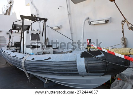 Inflatable amphibious boat on naval ship.