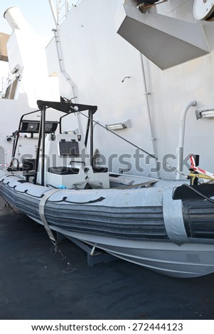 Inflatable amphibious boat on naval ship.