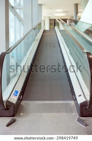 Empty escalator stairs in the mall.