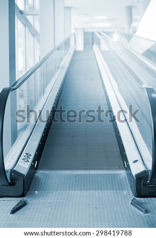 Empty escalator stairs in the mall.